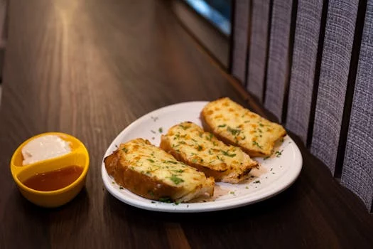 cheesy garlic bread slices golden
