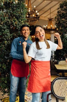 friendly restaurant manager smiling